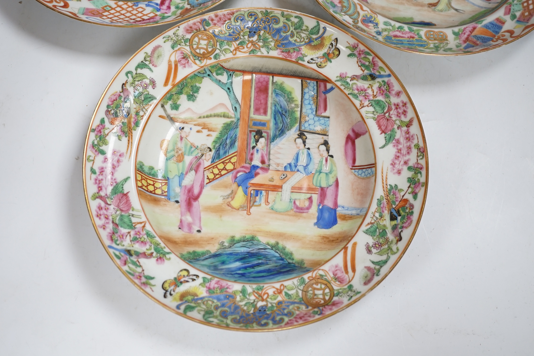 Three early 19th century Chinese famille rose soup plates, 25.5m diameter